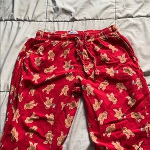 Gingerbread men eating pizza PJ pants
